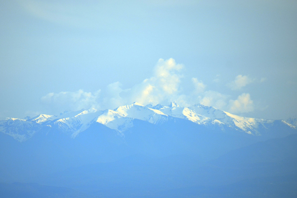 We have a view of the Olympic Mountains to the south. They are about 80 miles away. They are visible on a clear day which is most summer days. But the best viewing is in the winter on a clear day when there is little haze.